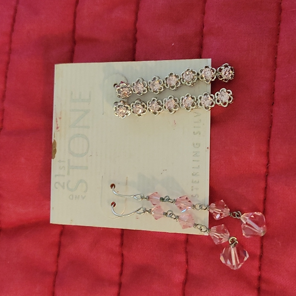 2 pair of silver earrings